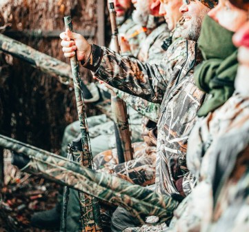 What color is the safest choice for clothing for hunting?